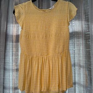 Yellow gingham top with buttons on back.